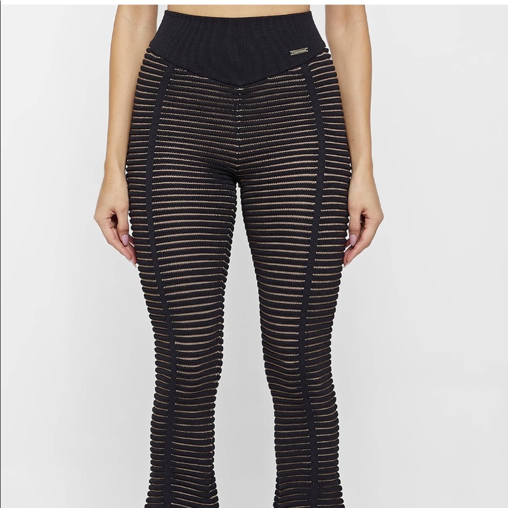 Brand new with tags. Beautiful pair of pants but unfortunately too long for me.